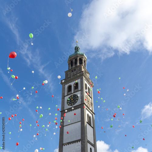 Turamichele celebration with ballons in front of Perlach tower in Augsburg, Germany, Bavaria