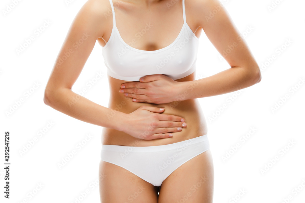 Woman massaging stomach pain - obrazy, fototapety, plakaty 