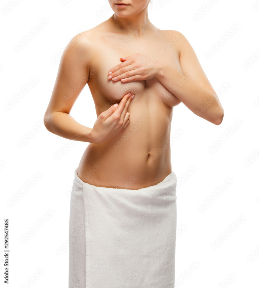 Woman examining breast isolated on white background Woman examining breast isolated on white background