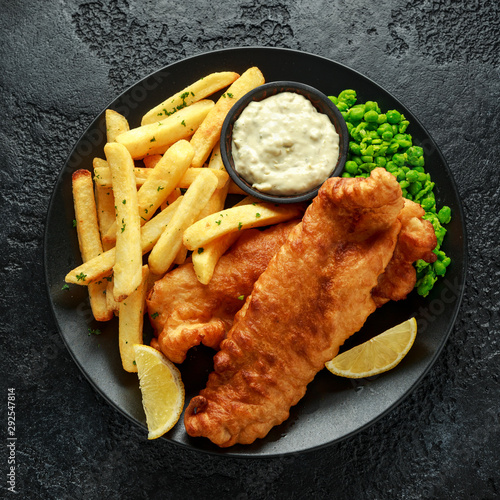 Canvas Print British Traditional Fish and chips with mashed peas, tartar sauce and cold beer
