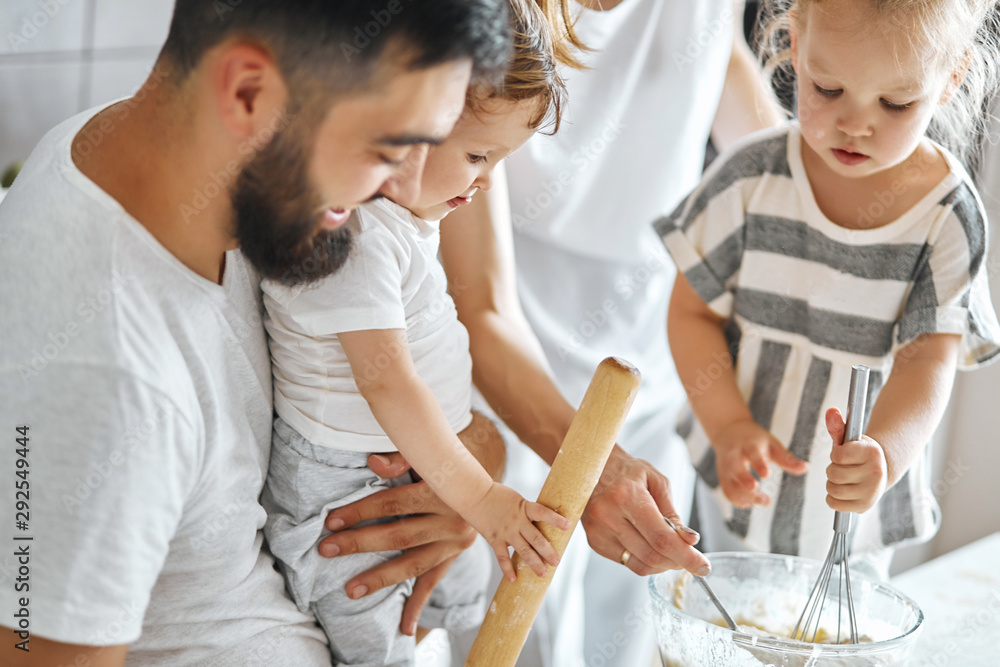 Obraz premium Family preparing pastry in the kitchen, close up cropped photo.lifestyle, free time, spare time