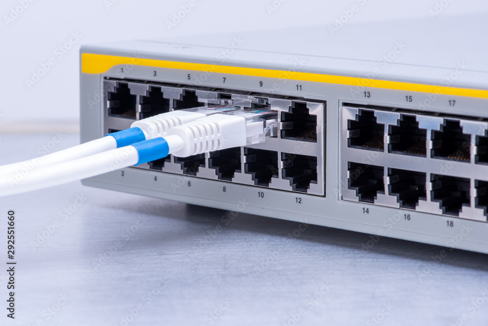 Network Switch And UTP Ethernet Cables Close-up Network Switch And UTP Ethernet Cables Close-up