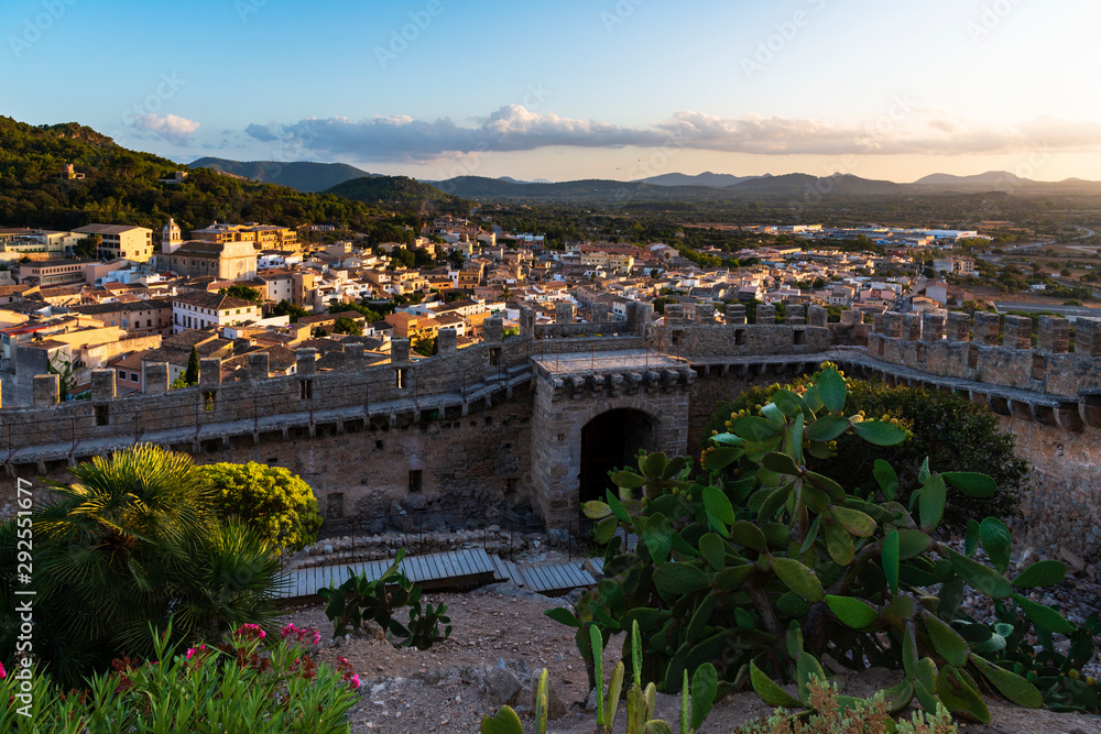Sunset view from the ramparts of the castle on the town of Capdepera Majorca