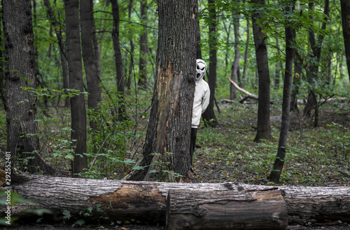 ghost in white in a mystical forest
