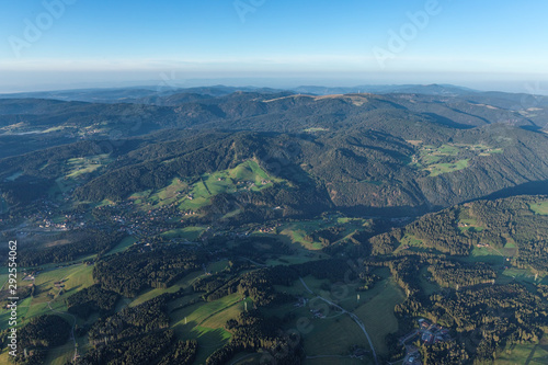 Amazing landscape of the Black Forest in the morning with fog during sunrise, seen from a hot-air ballon, Hinterzarten, Germany © Michael