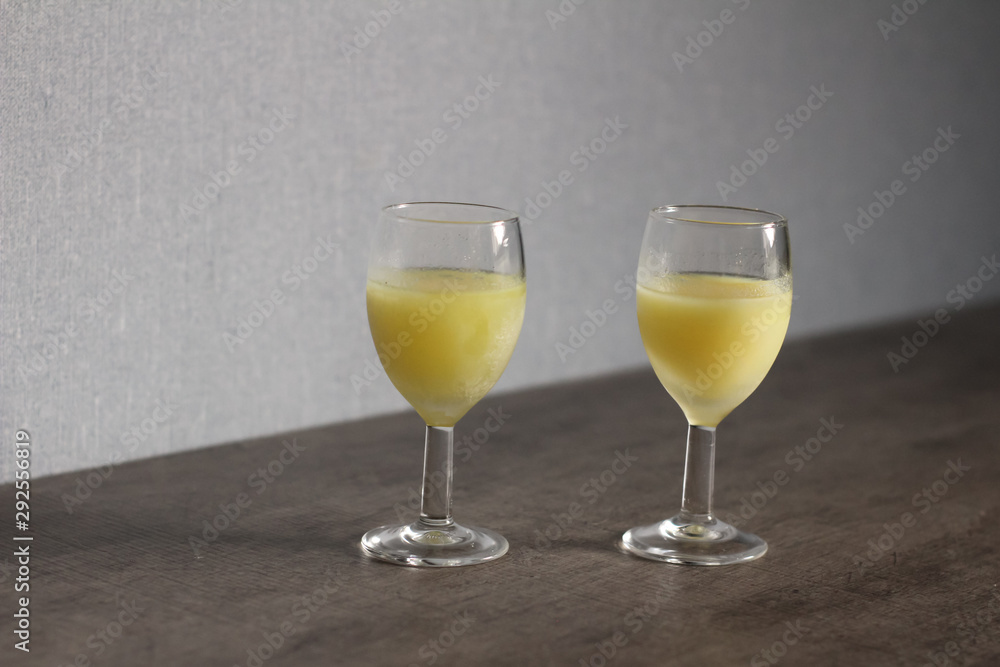 Two glasses of crema di limoncello, italian dessert drink