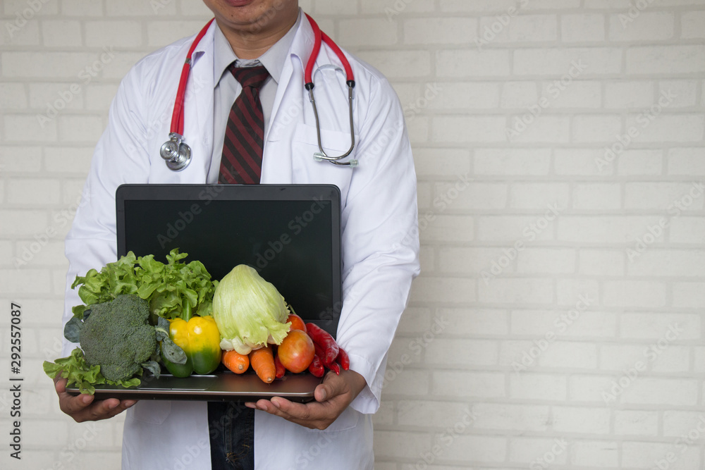Healthy food and clean concept, hands doctor with vegetables Healthy food and clean concept, hands doctor with vegetables