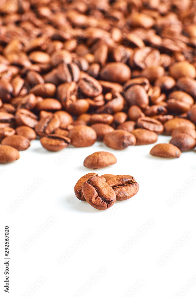 Roasted coffee beans isolated on white background with space for your text Roasted coffee beans isolated on white background with space for your text