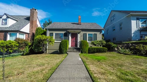 Small suburban home approach; 4k dolly shot