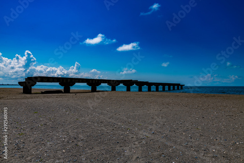 abandoned pier on the seashore photo