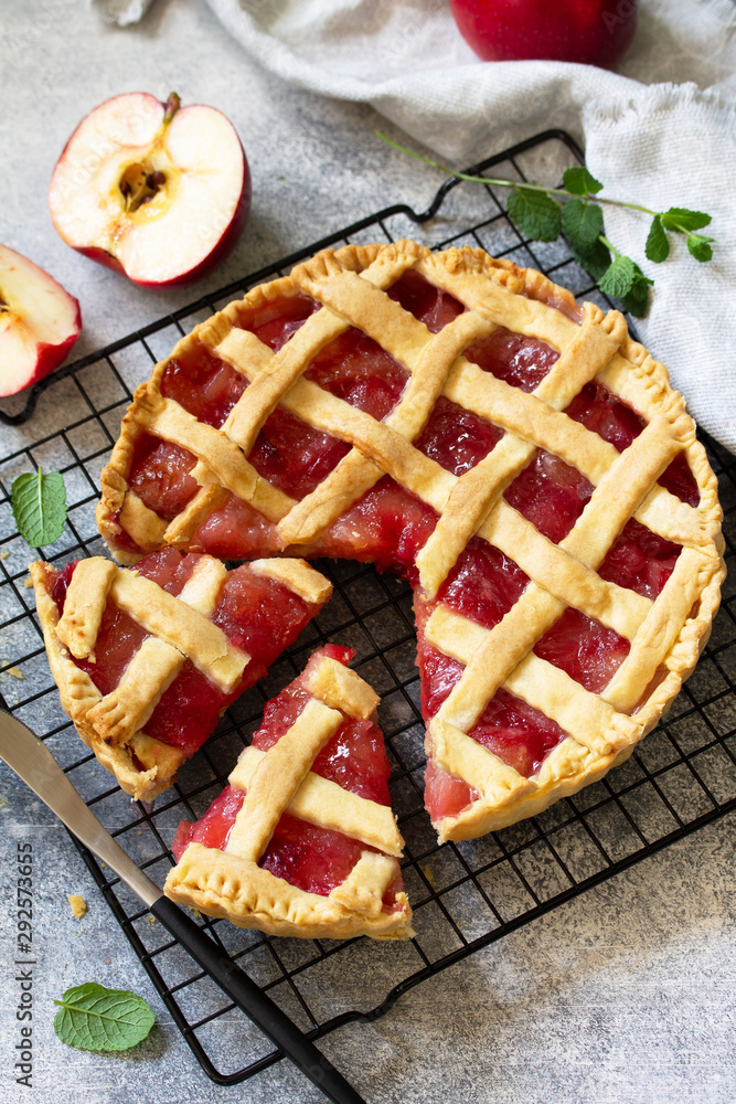 Homemade baking. Autumn apple pie on a light stone or slate table. Homemade baking. Autumn apple pie on a light stone or slate table.