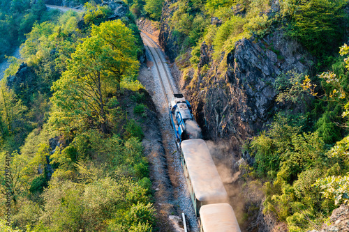 old steam train running through the valley