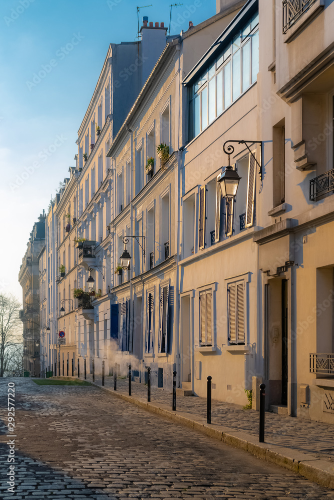 Montmartre in Paris, a very romantic parisian street with typical houses 