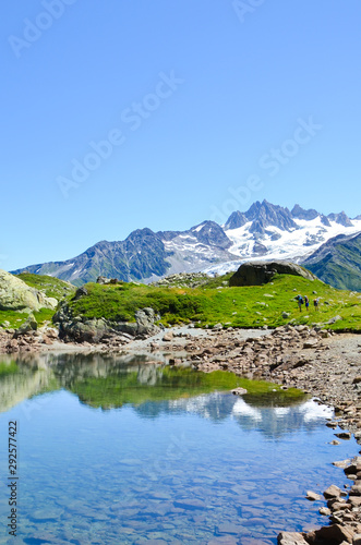 Stunning Lac de Cheserys  Lake Cheserys near Chamonix-Mont-Blanc in French Alps. Alpine lake with snow capped mountains in the background. France Alps  Tour du Mont Blanc trail. Nature background