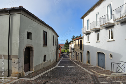 Frigento, Italy, 09/28/2019. A narrow street among old buildings of a mountain village.