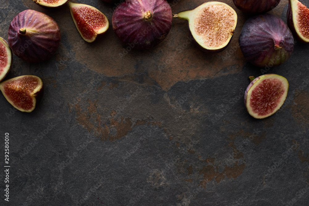 top view of ripe delicious figs on stone background top view of ripe delicious figs on stone background