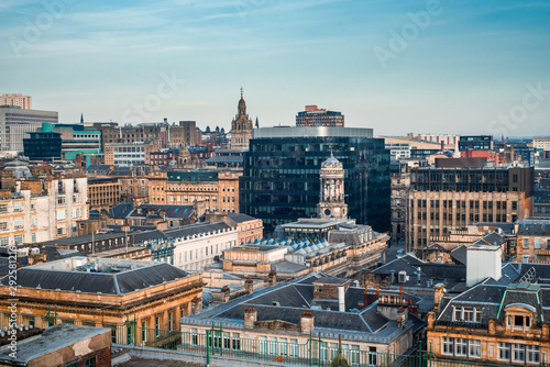 A rooftop view of the mixed architecture of old and new buildings in Glasgow city in late afternoon light, Scotland photo