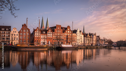 Promenade an der Trave der Hansestadt Lübeck mit Booten  photo