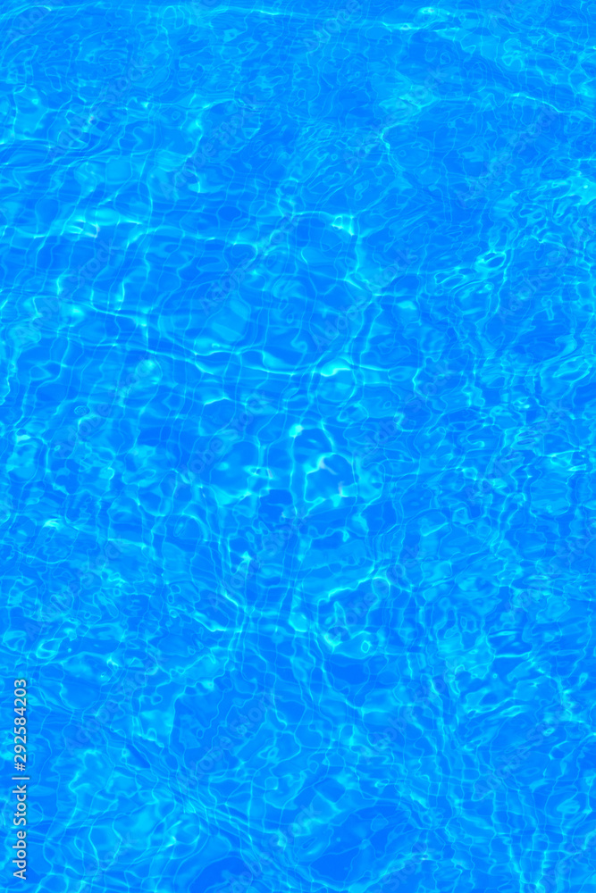 The background of the water in the pool is blue, azure texture
