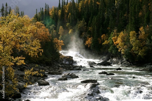 Waterfall in an autumn forest