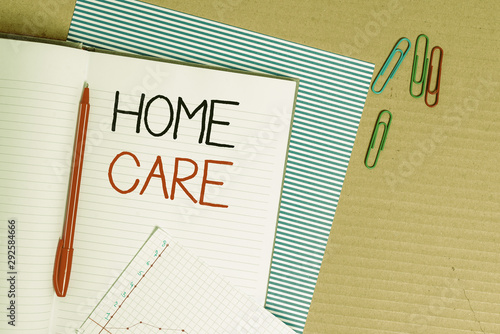 Writing note showing Home Care. Business concept for Place where showing can get the best service of comfort rendered Striped paperboard notebook cardboard office study supplies chart paper photo