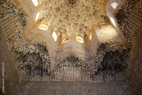 Arabic wall stone carvings and pattern texture at Alhambra palace in Granada