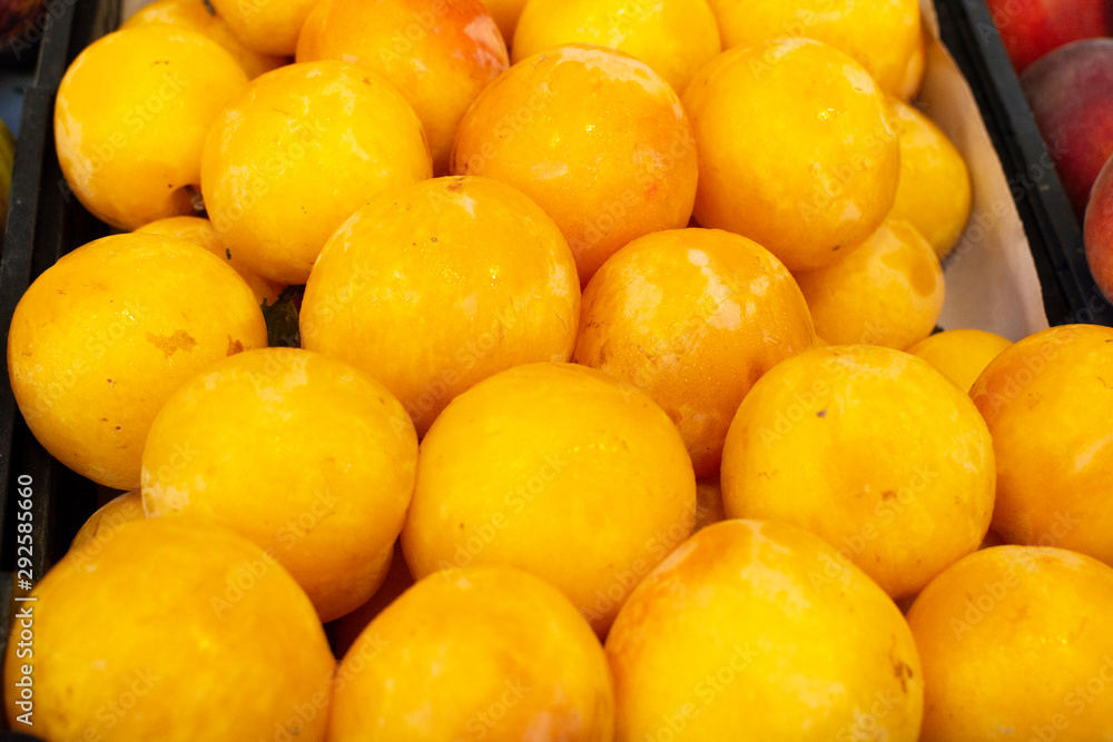 Sweet ripe yellow plums, healthy organic fruits