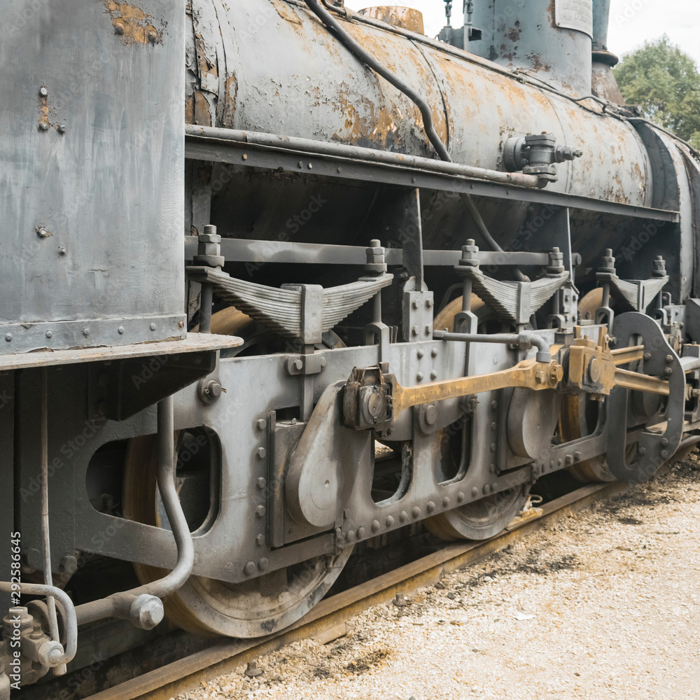 Vintage steam locomotive being restored illustrating hobby or vintage  industry or transportation technology.  
