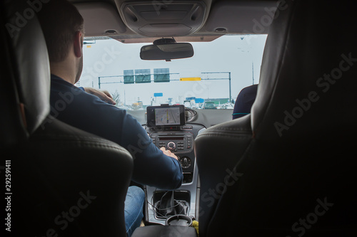 Driver in the car controls the navigator.