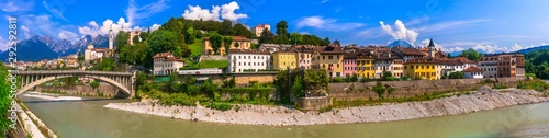 Breathtaking panorama of beautiful Belluno town surrounded by Dolomites mountains. Northen Italy