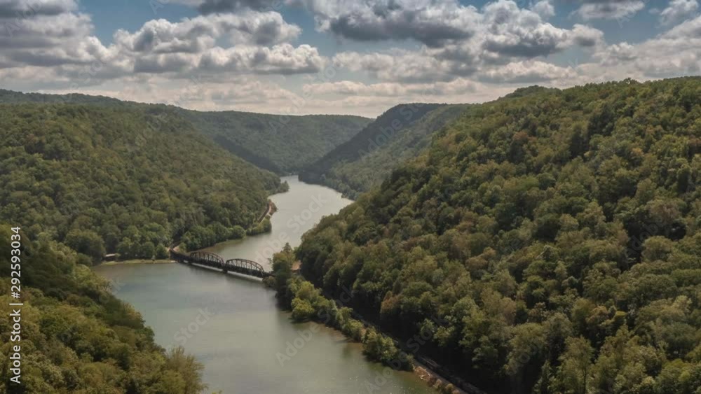 Time lapse of the New River Gorge with traing going over bridge in West Virginia. Time lapse of the New River Gorge with traing going over bridge in West Virginia.
