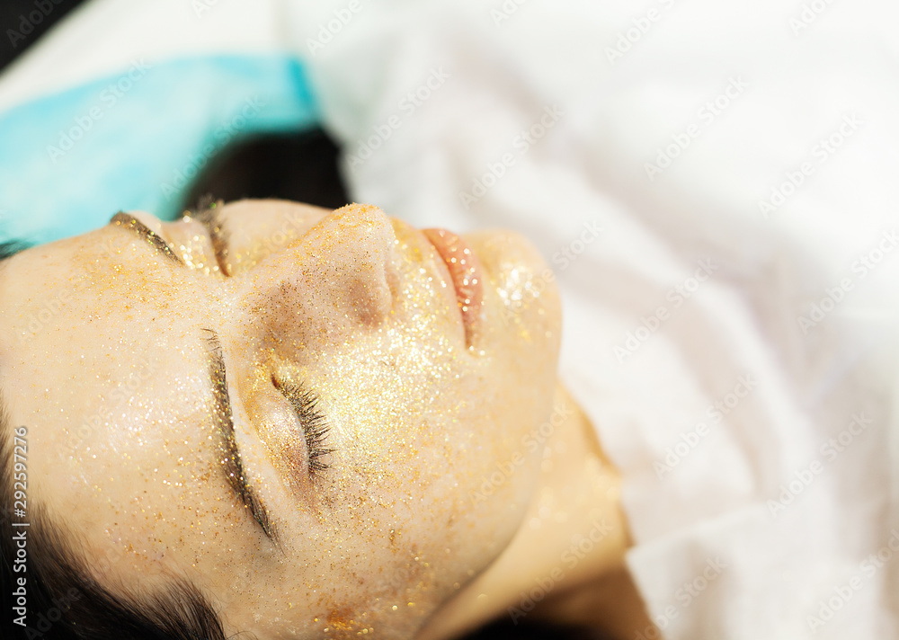 Spa therapy for young woman having facial mask at beauty salon. Spa therapy for young woman having facial mask at beauty salon.