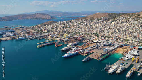 Aerial photo of industrial old shipyard repairing small boats in Mediterranean port