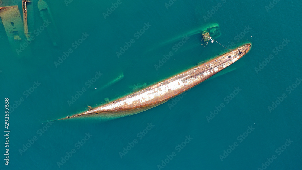Aerial top down photo of abandoned destroyed industrial ship in Mediterranean destination Aerial top down photo of abandoned destroyed industrial ship in Mediterranean destination