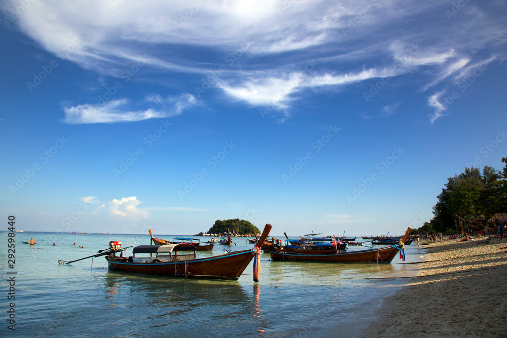 Tropical sea with long tail boat in south thailand 