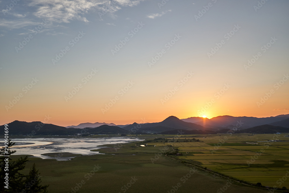 A sunset view of the Sunchoenman Bay Wetland Reserve in South Korea.