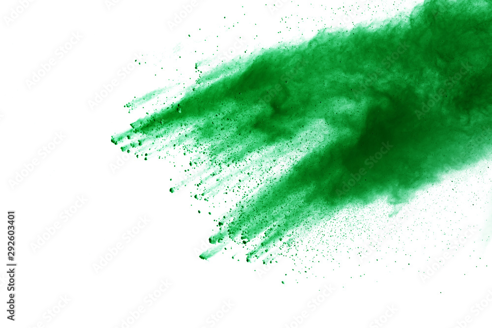 Green powder explosion on white background. Green powder explosion on white background.