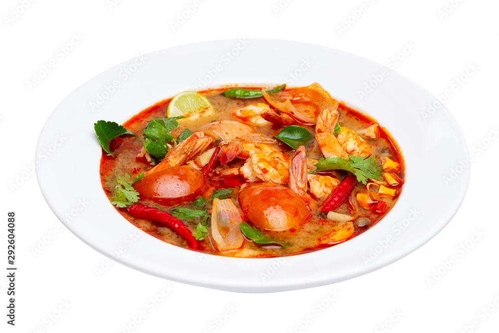 Closeup plate of traditional thai soup - tom yum kung with shrimps and tomatoes isolated at white background. Closeup plate of traditional thai soup - tom yum kung with shrimps and tomatoes isolated at white background.