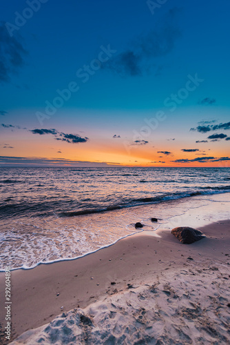 Fototapeta Naklejka Na Ścianę i Meble -  Rocks in the beach during sunest.