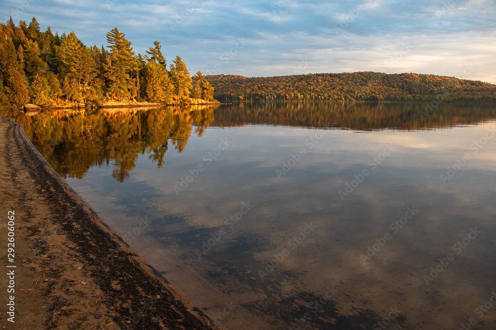 Rich colors at dusk on the water in Algonquin Park in autumn