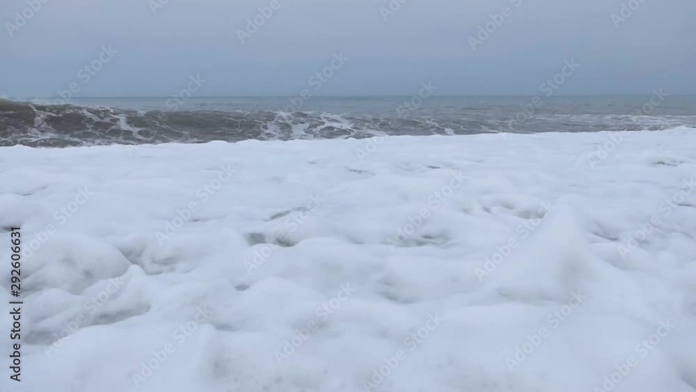 Splashing sea waves at shore stones on stormy cloudy day. Black Sea coast. Roylaty free Full HD stock footage related to sea, sailing, travel, nature, ecology Splashing sea waves at shore stones on stormy cloudy day. Black Sea coast. Roylaty free Full HD stock footage related to sea, sailing, travel, nature, ecology