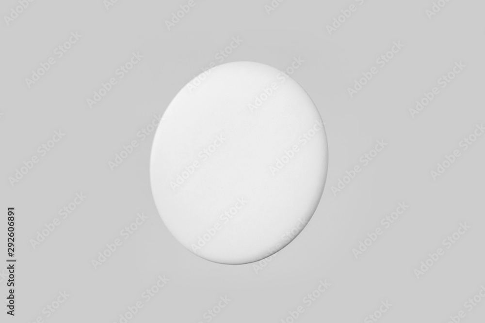 top view of white badge on white background top view of white badge on white background
