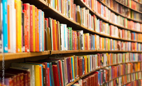 Photo Library with many shelves and books, diminishing perspective and shallow dof