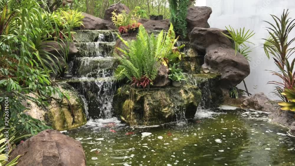 artificial waterfall in the garden artificial waterfall in the garden