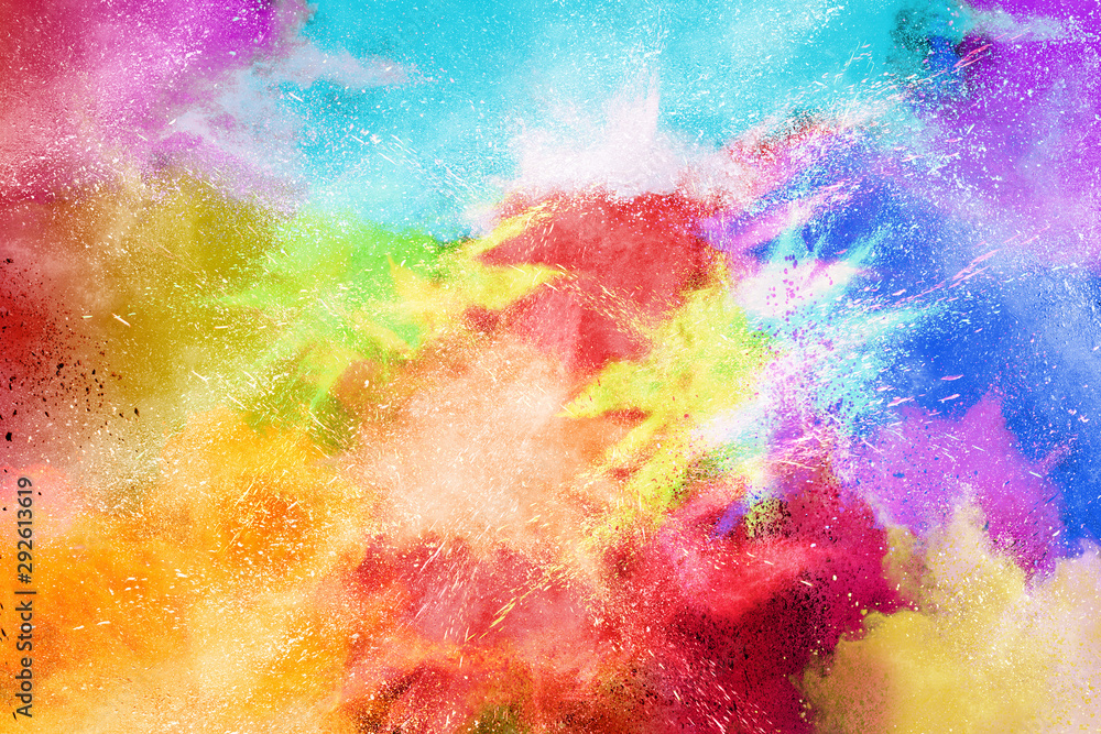 Fototapeta premium Freeze motion of colorful color powder exploding on white background. Paint Holi.