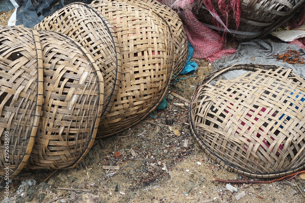 Closeup of discarded broken bamboo baskets in rural Vietnam
