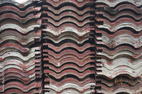 Stacks of nested roof tiles form an abstract pattern in rural Vietnam © John