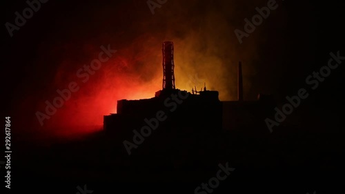 Creative artwork decoration. Chernobyl nuclear power plant at night. Layout of abandoned Chernobyl station after nuclear reactor explosion. Selective focus