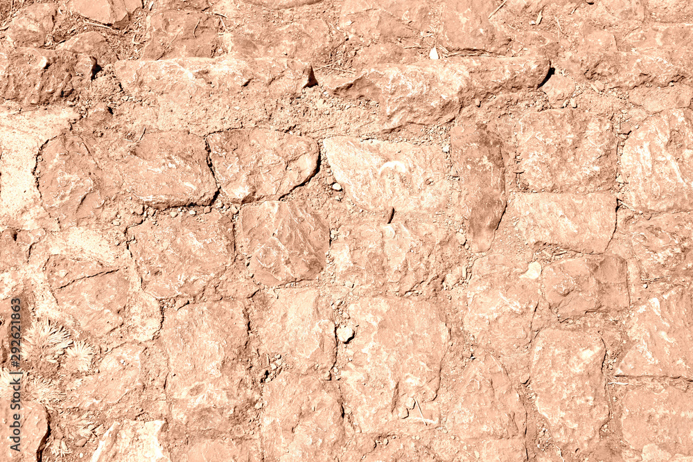 Old stone footpath close up. Abstract background Old stone footpath close up. Abstract background