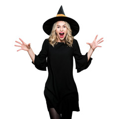 Attractive young woman dressed in witch halloween costume isolated over white background. Sensual Halloween Witch Studio Portrait.